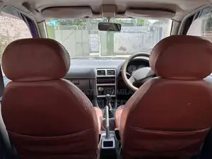 Photo - Home Car with Air Conditioning and Reliable Engine