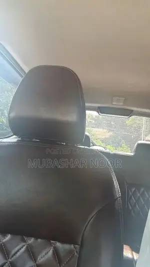 Nissan Vehicle - Imported Sedan with Multiple Door Options