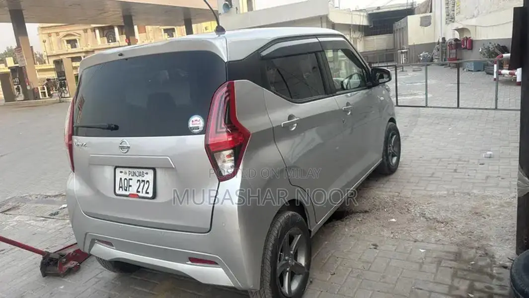 Nissan Vehicle - Imported Sedan with Multiple Door Options