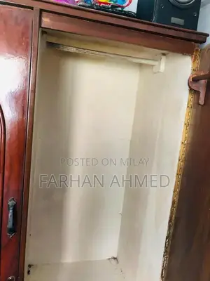 Wooden Wardrobe Cupboard - Sturdy and Polished