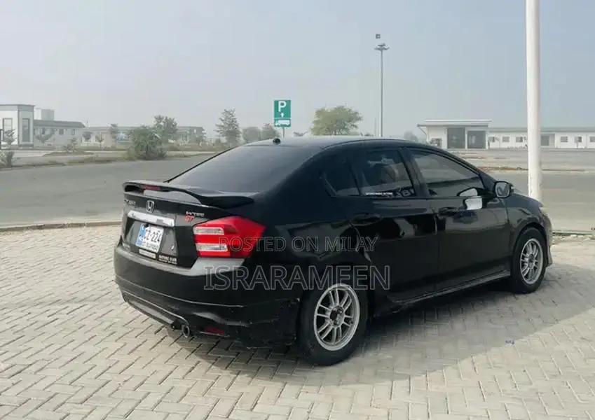 2015 City Attitude Sedan - Black Compact Car