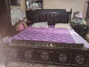 Photo - Wooden Bed with Side Table - No Mattress Included