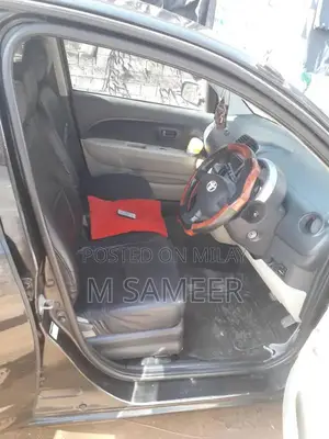 Photo - Family-Friendly Car in Good Condition, Low Mileage