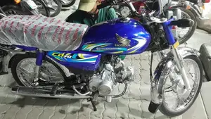 Photo - Blue Shining CD 70 Motorcycle with Genuine Parts