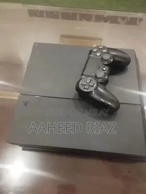 PlayStation 4 Fat 1TB Gaming Console with Controller