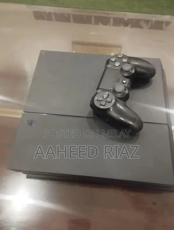 PlayStation 4 Fat 1TB Gaming Console with Controller