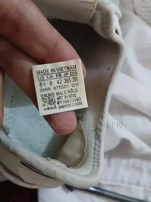 Photo - Adidas White HU Style Sneakers - Size 42 Casual Footwear