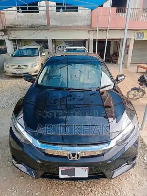 Photo - Honda Civic VTi Oriel Prosmatec UG Sedan 2020