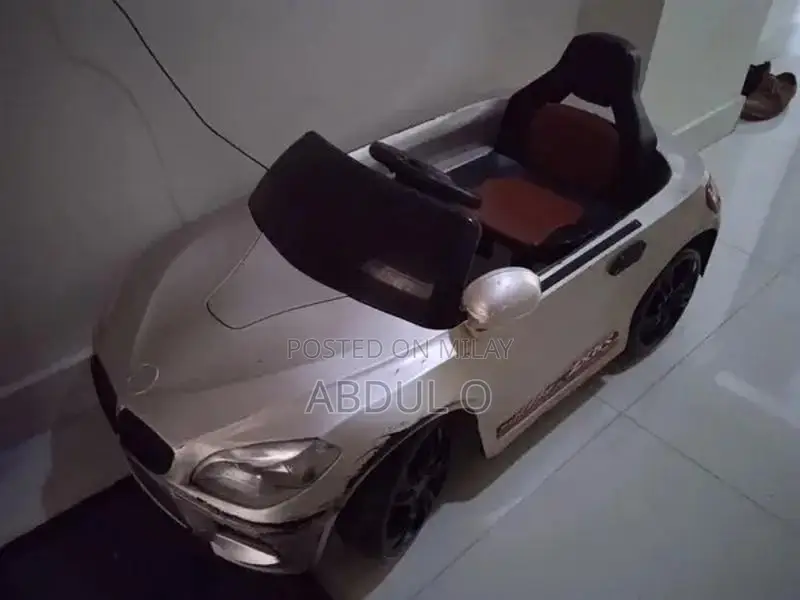 Kids BMW Electric Ride-On Car with Music and Lights