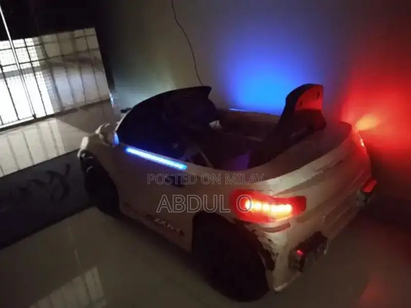 Kids BMW Electric Ride-On Car with Music and Lights