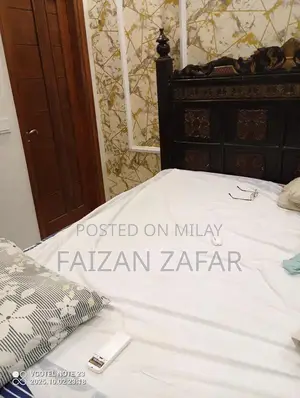 Photo - King Size Bed Frame in Used Condition