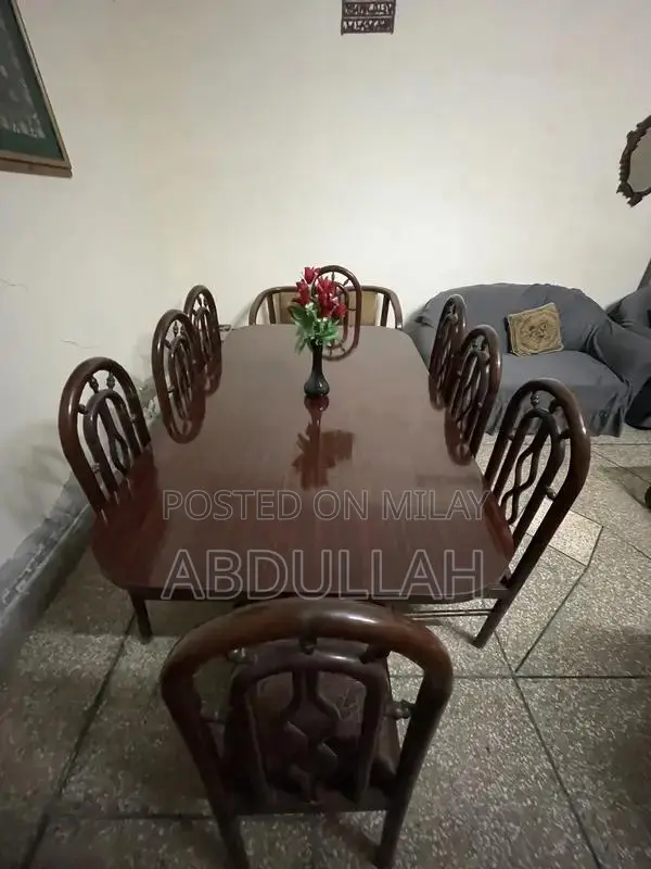 Spacious Dining Set with 8 Chairs in Pristine Condition