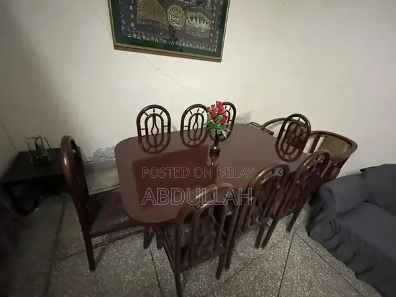 Spacious Dining Set with 8 Chairs in Pristine Condition