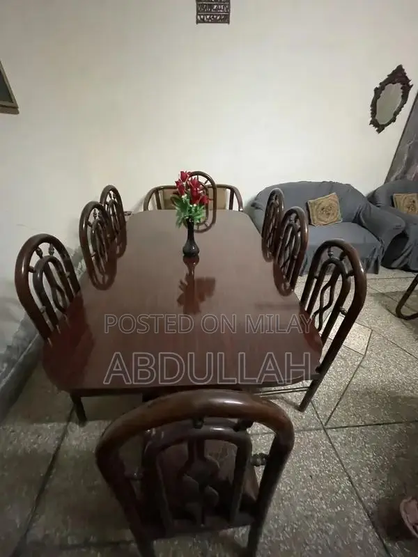 Spacious Dining Set with 8 Chairs in Pristine Condition