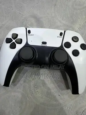 Photo - Retro Game Stick with 3000+ Preloaded Games and HDMI