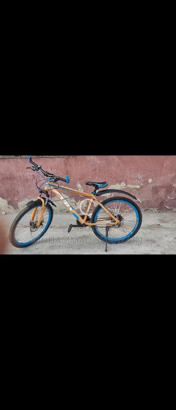 XMX 26-Inch Mountain Bicycle with 7-Speed Shimano Gears