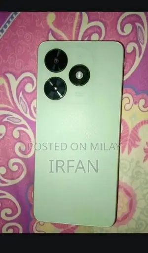 Photo - Compact Smartphone with Basic Features and Affordable Design