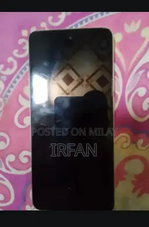 Compact Smartphone with Basic Features and Affordable Design