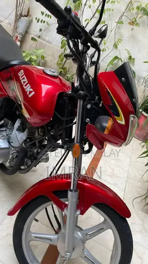 Photo - Suzuki 110 Motorcycle - Well-Maintained Classic Ride