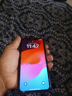 Photo - Used iPhone 11 64GB Smartphone with Good Battery