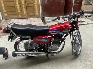 Photo - Honda 125 Motorcycle 2024 Model Red Sport Bike