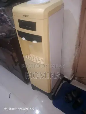 Photo - Hot and Cool Water Dispenser with Multiple Temperature Settings