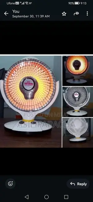 Photo - Portable Electric Heater with Humidifier Features