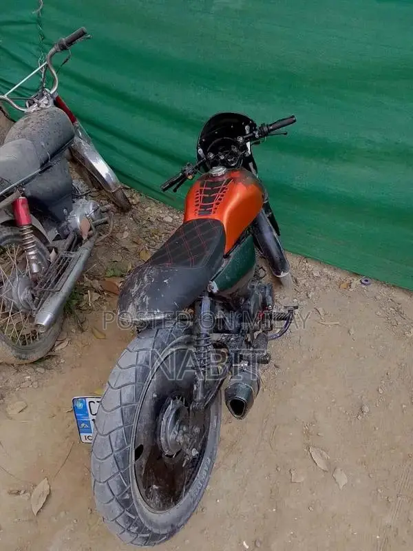 Custom Modified Motorcycle with Extended Frame and Akrapovic Exhaust