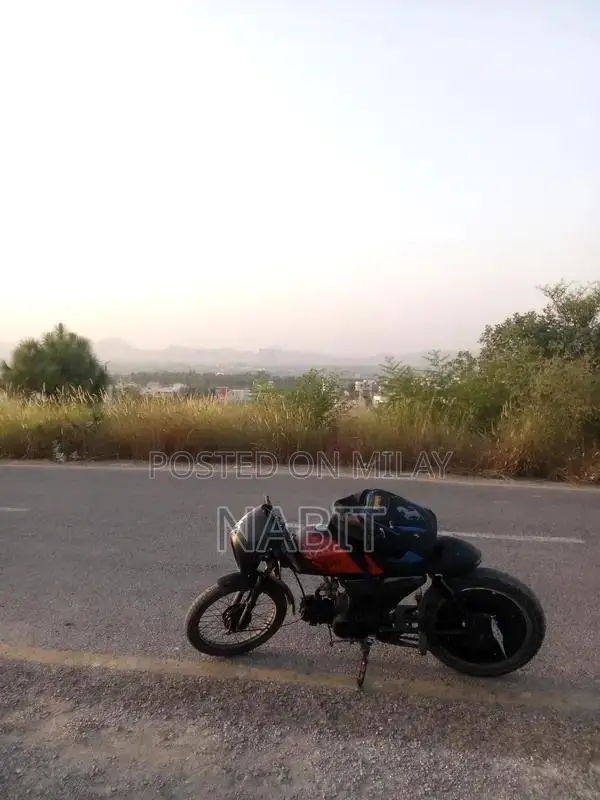 Custom Modified Motorcycle with Extended Frame and Akrapovic Exhaust