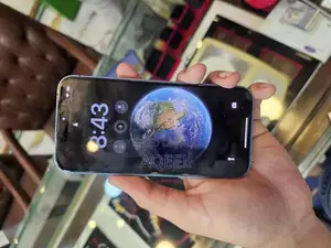 Photo - Apple iPhone 13 128GB Blue Smartphone