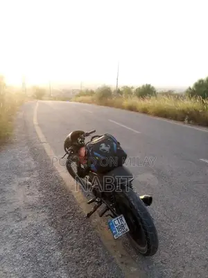 Custom Modified Motorcycle with Extended Frame and Akrapovic Exhaust