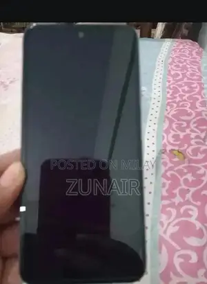 Photo - Budget Smartphone with Extended Warranty and Pristine Condition