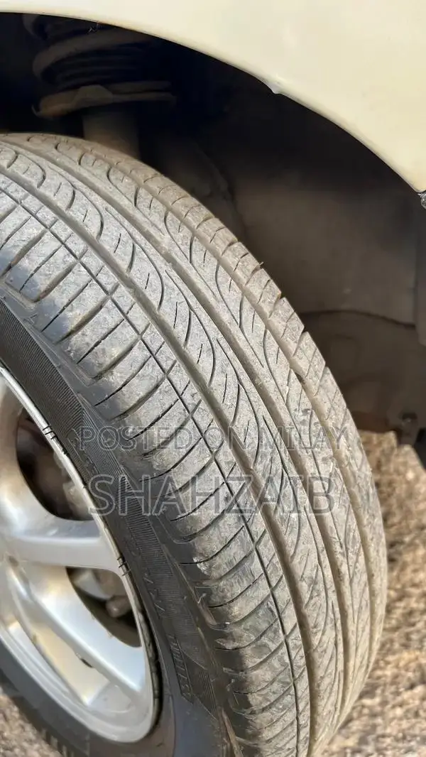 2012 Daihatsu Mira Pearl White Pearl Imported Compact Car