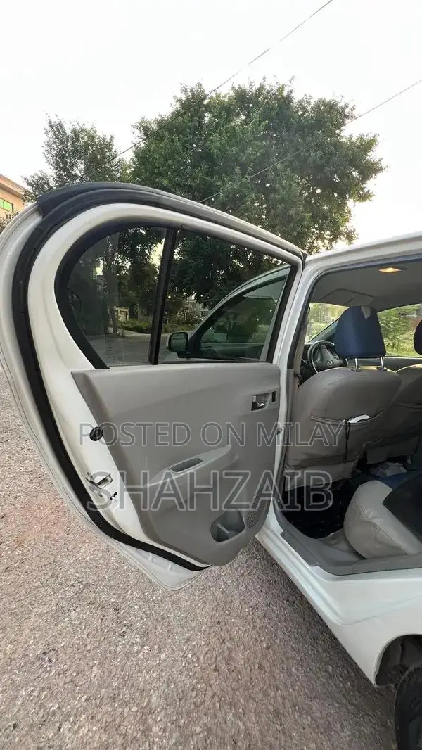 2012 Daihatsu Mira Pearl White Pearl Imported Compact Car