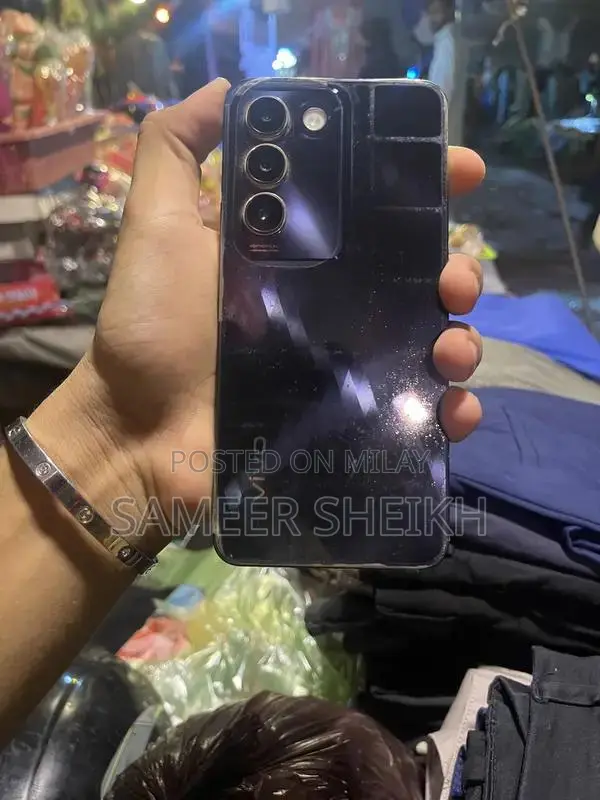 Compact Mobile Device with Charger and Box