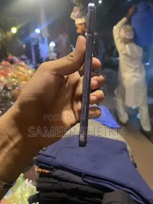 Compact Mobile Device with Charger and Box