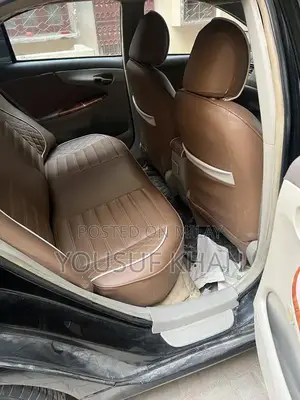 Photo - Toyota Corolla XLi/GLI Sedan Compact Car