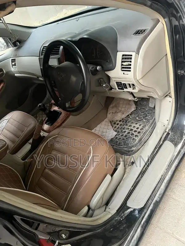 Toyota Corolla XLi/GLI Sedan Compact Car