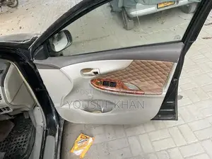 Toyota Corolla XLi/GLI Sedan Compact Car