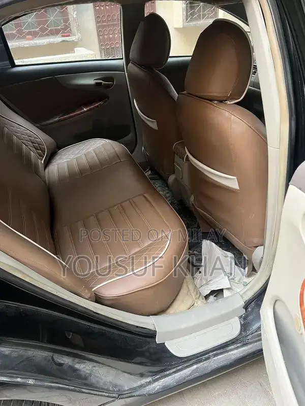 Toyota Corolla XLi/GLI Sedan Compact Car