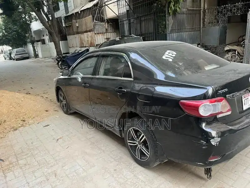 Toyota Corolla XLi/GLI Sedan Compact Car