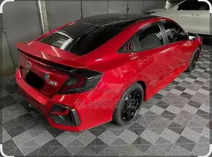 Photo - Professional Car Wrapping and Modified Parts Service