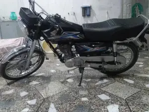 Photo - Honda 125cc Motorcycle - Low Mileage Classic Model