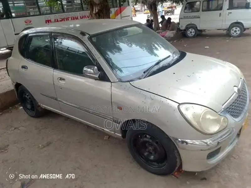 Toyota Duet Compact Hatchback - Reliable Urban Vehicle