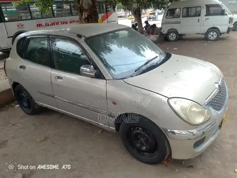 Toyota Duet Compact Hatchback - Reliable Urban Vehicle