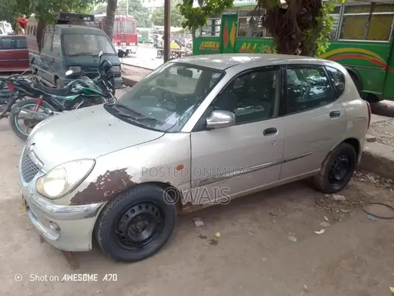 Toyota Duet Compact Hatchback - Reliable Urban Vehicle
