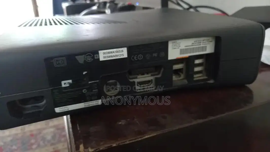 Xbox 360 Slim Console with 35 Pre-Installed Games Bundle