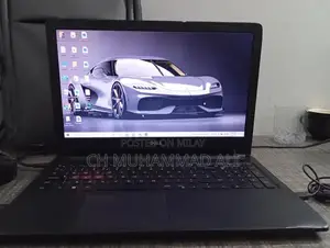 Photo - Dell Laptop with Slight Body Damage, Functional Condition