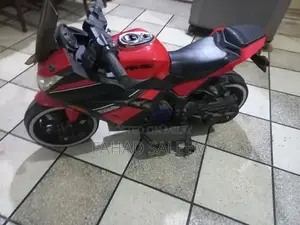 Kids Battery-Operated Ninja 250 Ride-On Bike