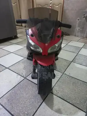 Kids Battery-Operated Ninja 250 Ride-On Bike